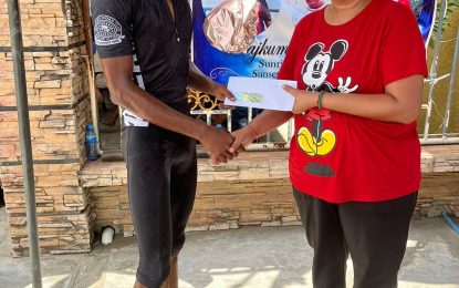 Cyclist Jeremiah Joseph receives special reward from sponsor of 50 miles cycle road race in Berbice