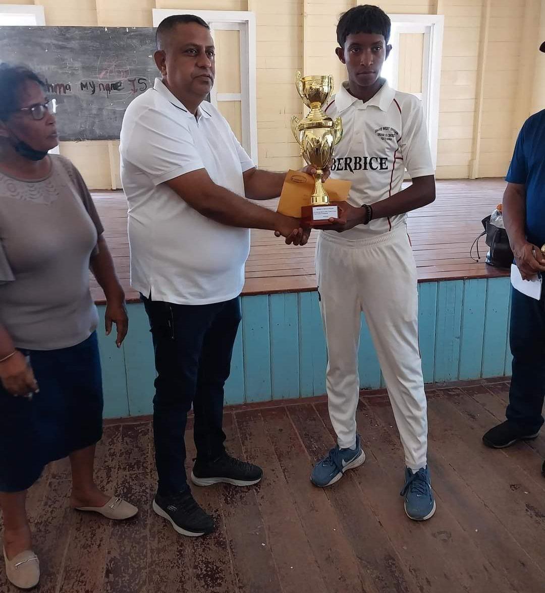 Region 6. Vice Chairman Zamal Hussain hands over winning trophy to the Albion Captain Farhan Balle.