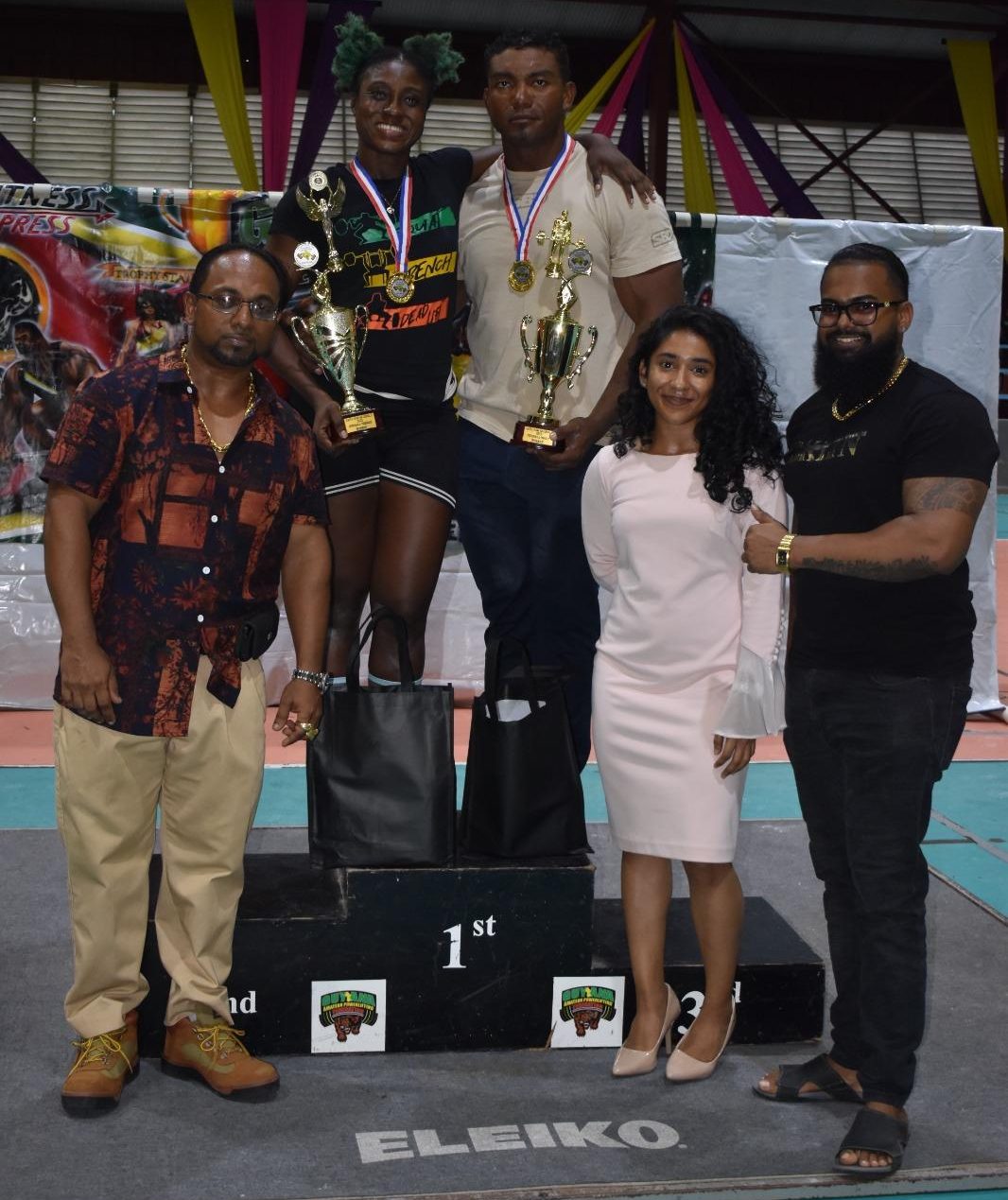 The Overall Best Male and female lifters showcase their silverware in the presence of sponsors.  