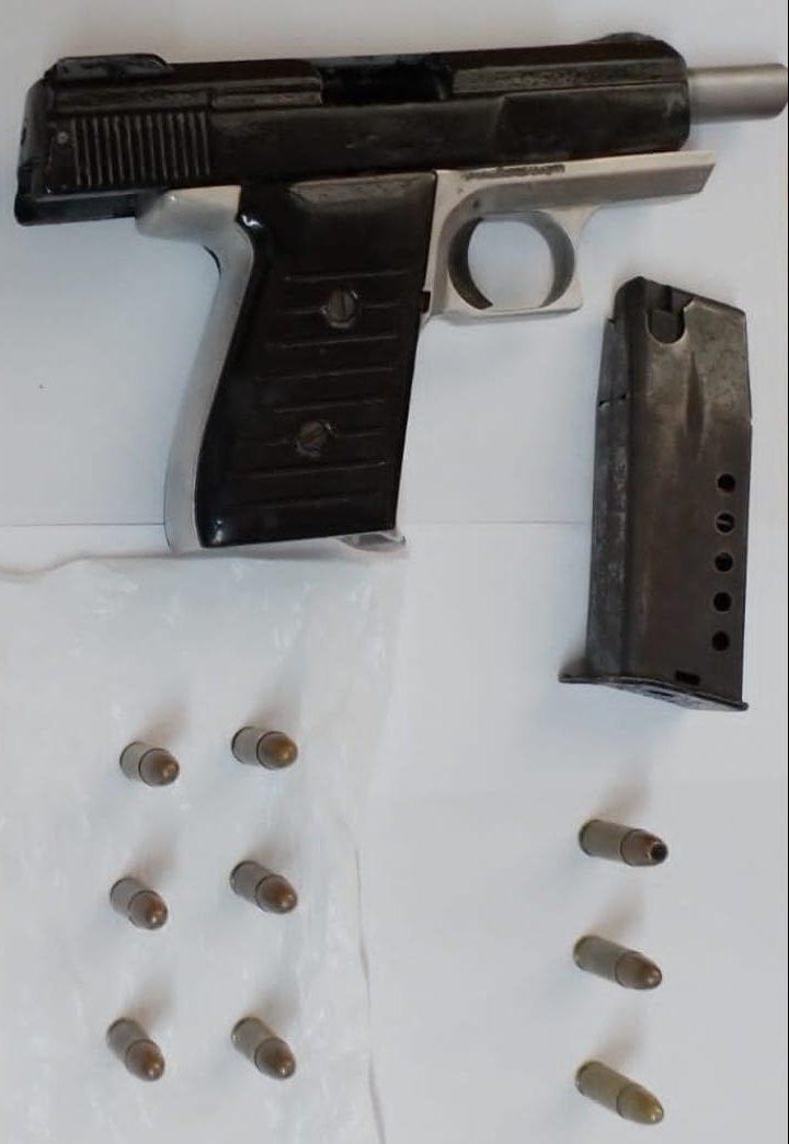 The illegal 9mm pistol and 9mm ammunition that was found