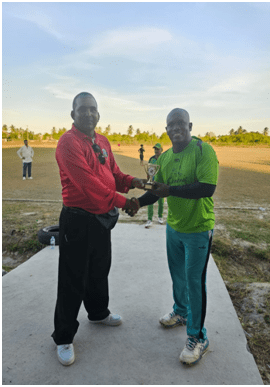 Anthony Ifill receives his MOM award from Umpire Samaroo.