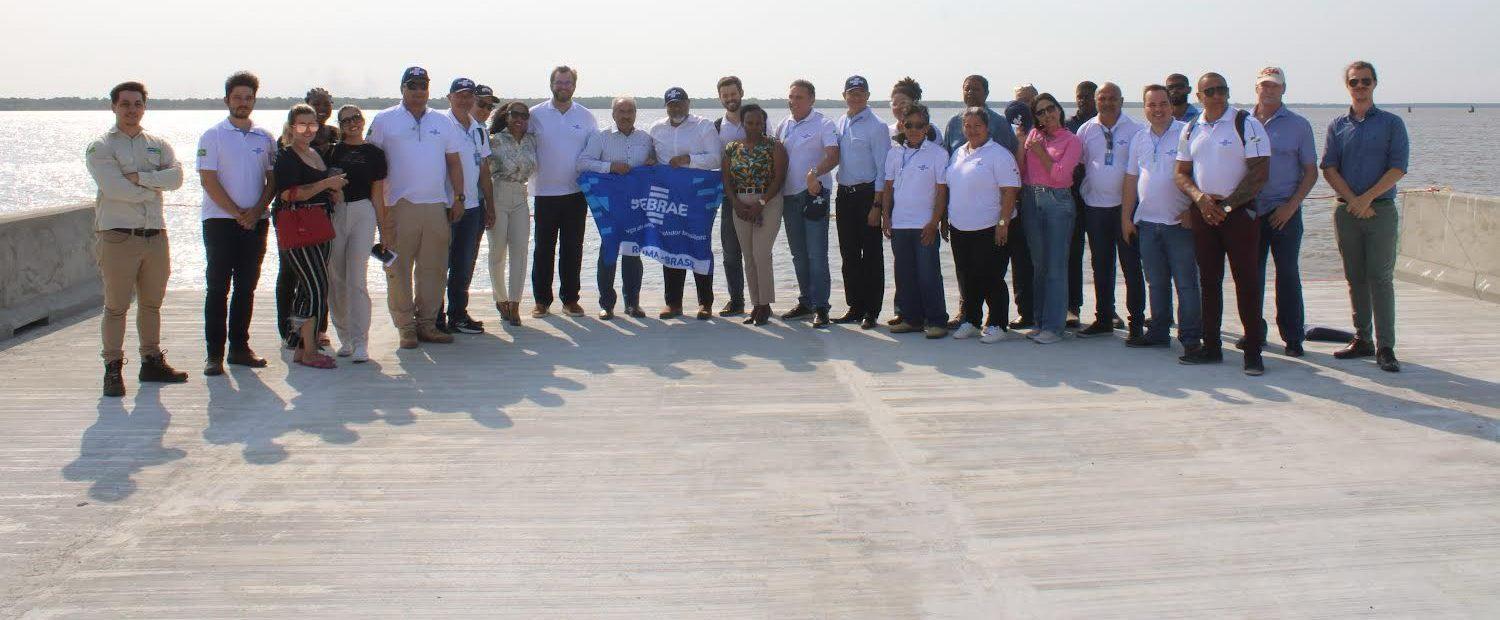 Brazilian officials and business men, Berbice chamber of commerce and CGX Officials at the recently constructed wharf, Berbice River