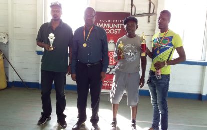 Esan Anderson leads after first leg of the Annual National Draughts competition