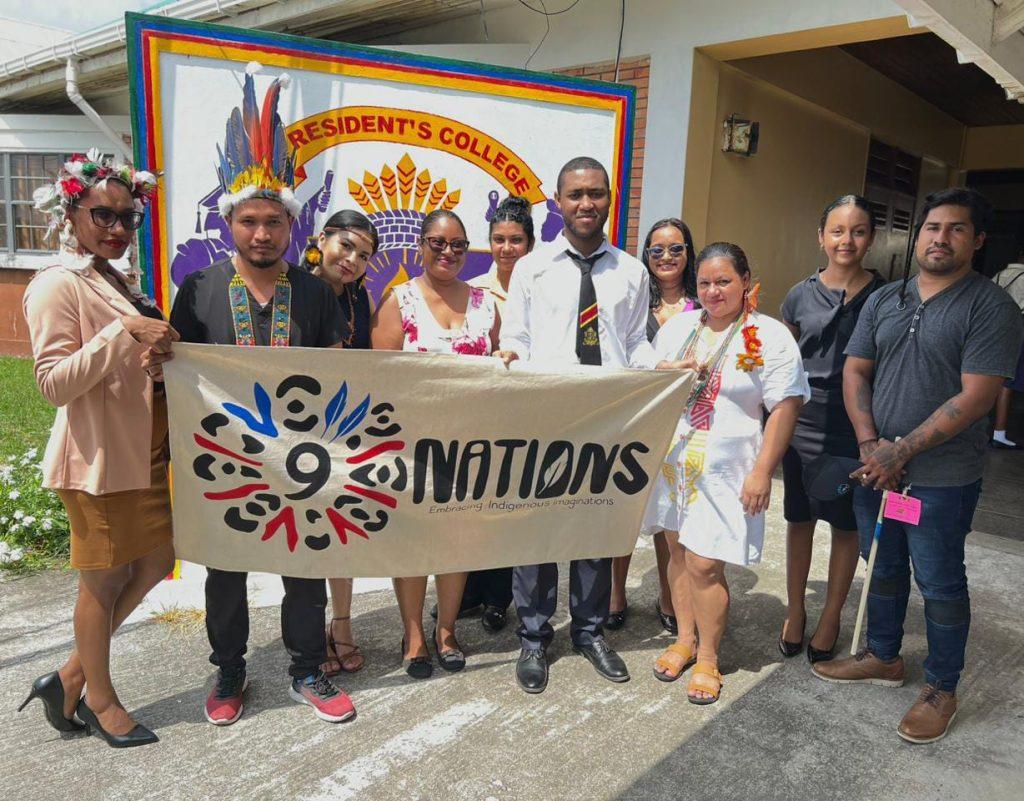 The language teacher brought the Nine Nations group to help PC observe Amerindian Heritage Month.  She is seen with Nine Nations Executives and members of the English Department of President's College.