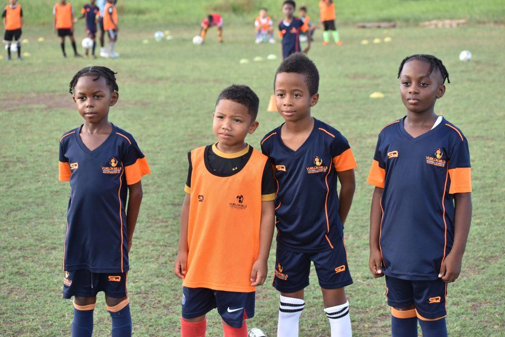 Winners of the Bend It Like Enet challenge pose for photo-op at yesterday's launch.