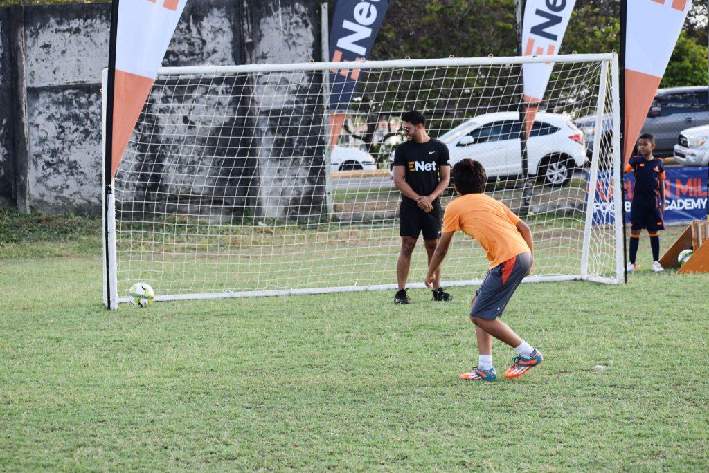 Young footballer scores during the Bend it Like Enet challenge.