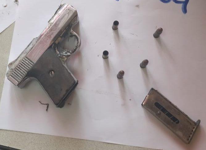 Gun recovered by police at the scene of the shooting