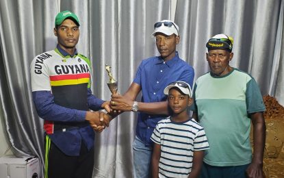 Former national cyclist assists National Junior cyclist Jeremiah Joseph