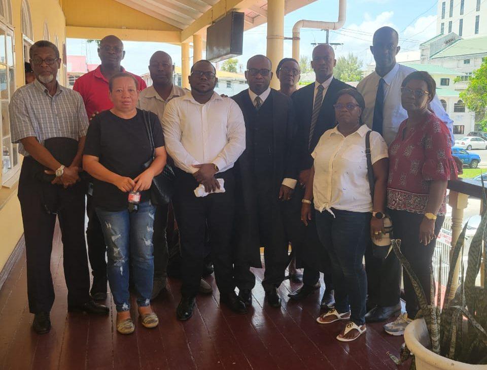 Members of the new GPSCCU team and their attorneys at the High Court on Monday