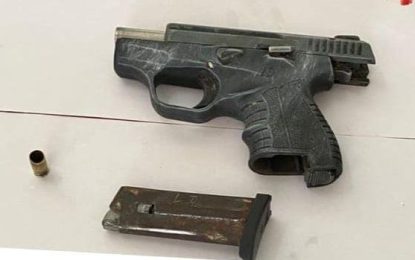 Man found with illegal gun next to Police Station