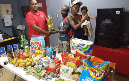 ASTP make donation to a family of four
