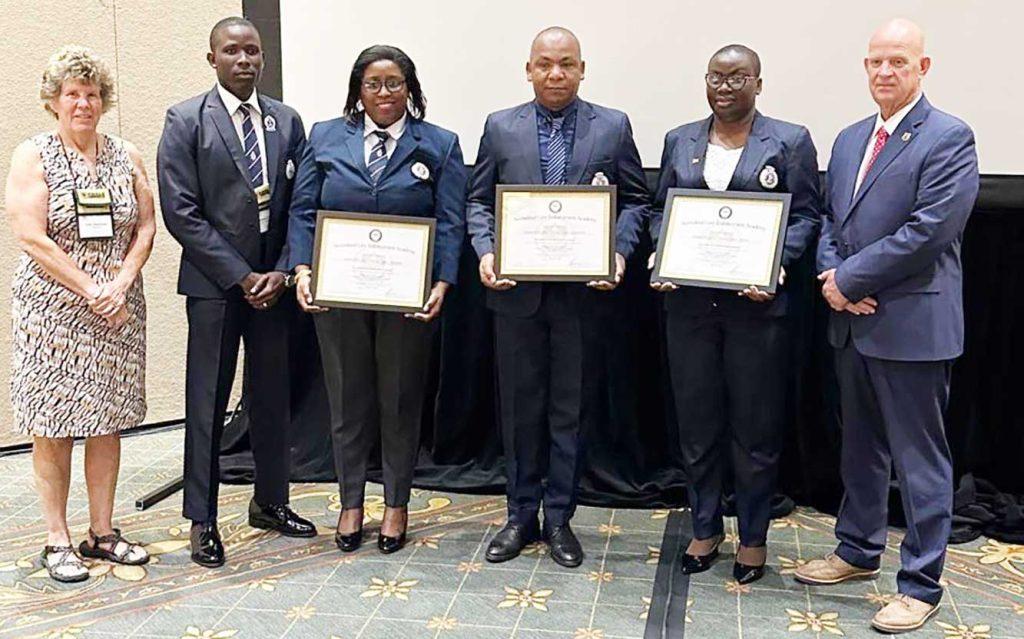 Guyana Police Force (GPF) Training Academy receives International Accreditation at IADLEST Conference in Arizona, Jun 3, 2024. In photo from right, IADLEST President Mike Ayers; GPF Superintendent Nicola Kendall, Deputy Commissioner ‘Administration’ Calvin Brutus; Superintendent Sonia Herbert; Assistant Superintendent Gladwin Hanover; IADLEST Kelly Alzaharma