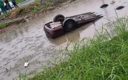 Man dies after car plunges into trench