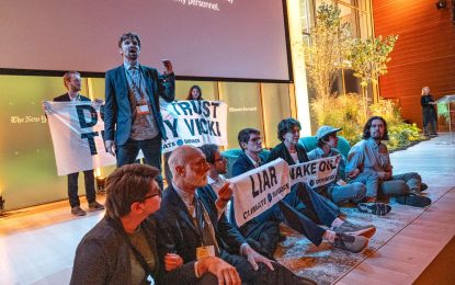 CEO of American Oil Company rushed off stage during climate event as protest erupts