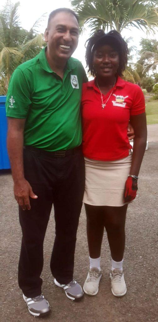 GGA president Aleem Hussain with alongside one of the young Trinidadian Junior Golf pros at Magdelena Grand Beach Golf Course.