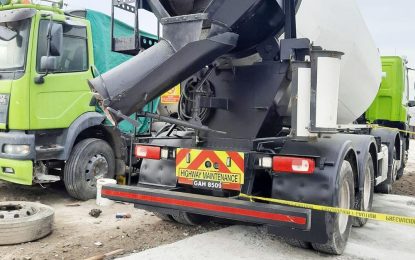 Worker crushed by cement mix truck