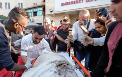 A Gaza medic realizes he’s carrying his own mother’s body, killed by an Israeli airstrike