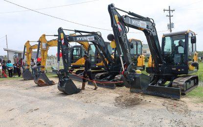 Agri. Minister hands over four mini-excavators to NDCs in Reg. 5