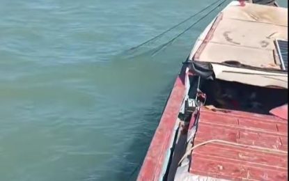 Fishermen bawling at sea as they reel in empty seines