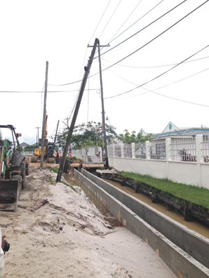 Utility companies given six weeks to clear hanging wire bundles from poles
