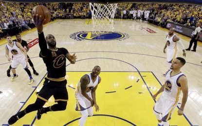 James, Irving explode to keep Cavs alive in NBA Finals