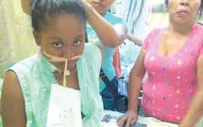 Bullet now lodged near shot teen waitress’ spine