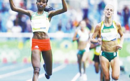 Ayana wins stunning  gold, denies doping