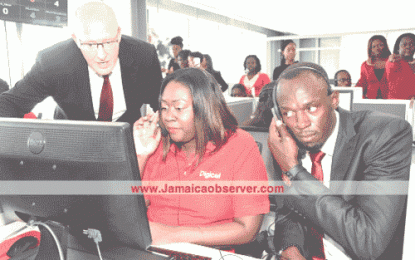 Bolt reports for first day at work as Digicel’s new CSO