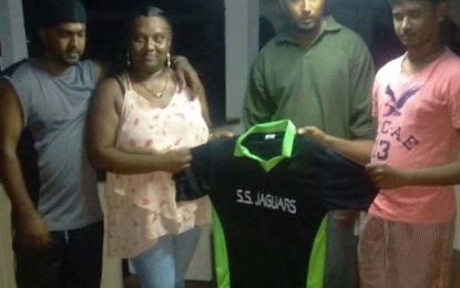 N and K Persaud make donation to SS Jaguars