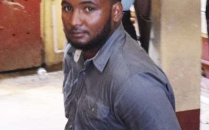 Security guard charged for threatening spouse with gun