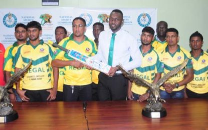 NYSCL champs Regal presents autograph bat to DOS Jones