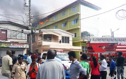 Fire guts three bonds in 4-storey Robb St. building