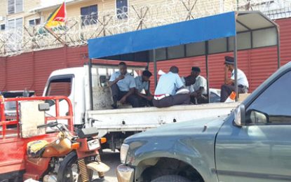 Remand inmate recaptured after scaling prison wall