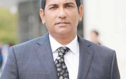 Two years jail for Ed Ahmad; ordered to repay US$2.6M to victims