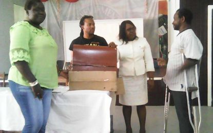 PNC donates sewing machine to amputee