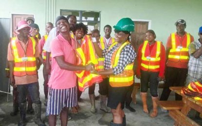 Haags Bosch recyclers receive safety gear from Puran Brothers