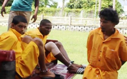 Three charged for prison inmate’s murder