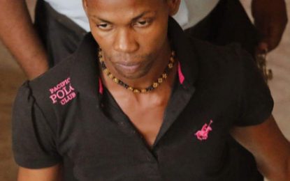 Ex-cop remanded on robbery under-arms charges