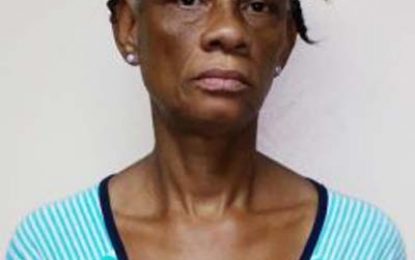 Neighbours charged for assaulting disabled mom