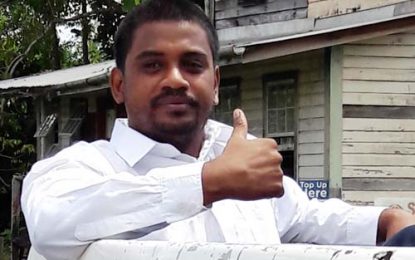 Captured husband gives thumbs up after remanded for teen wife’s murder  