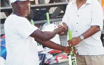 Minister Ramjattan hands out sports  gear to Upper Corentyne residents
