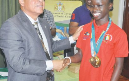 South American Youth Games champ Deshawna Skeete  calls on Dr. George Norton
