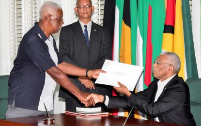 Desmond Trotman sworn-in as new GECOM Commissioner