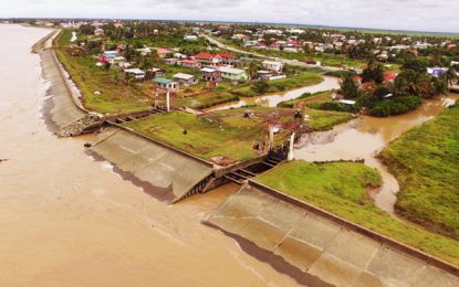 Authorities face dilemma with homes near seawalls