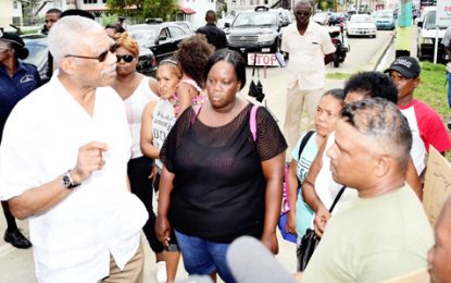 President meets with laid off security guards at New Amsterdam