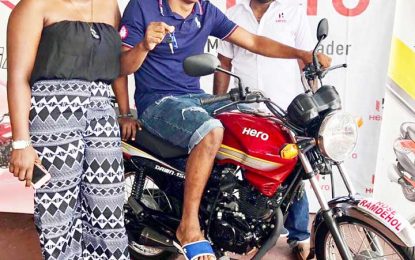 Phillip DeFlorimonte officially collects motorcycle prize from Corona Futsal tourney