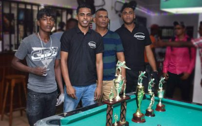 Tevendra John wins Labour day pools competition at Grand Central Bar