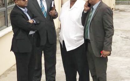 Ashni, Brassington fly out to the U.S … SOCU still seeking to question duo in ongoing fraud probes