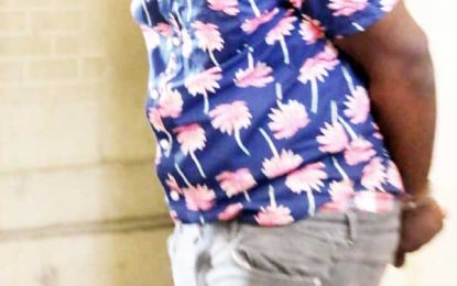 Man remanded for robbing money changer at gunpoint