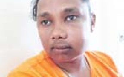 Teen charged with wounding head teacher